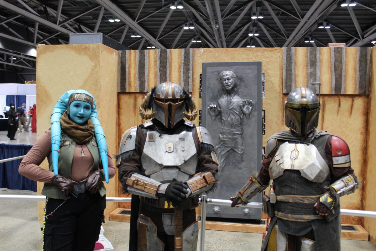 Cosplay representing Mandalorians, characters from the Star Wars universe created by George Lucas.