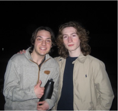 Logan Brown, left, joins his friend, Liam Gould (the writer), for a photograph.