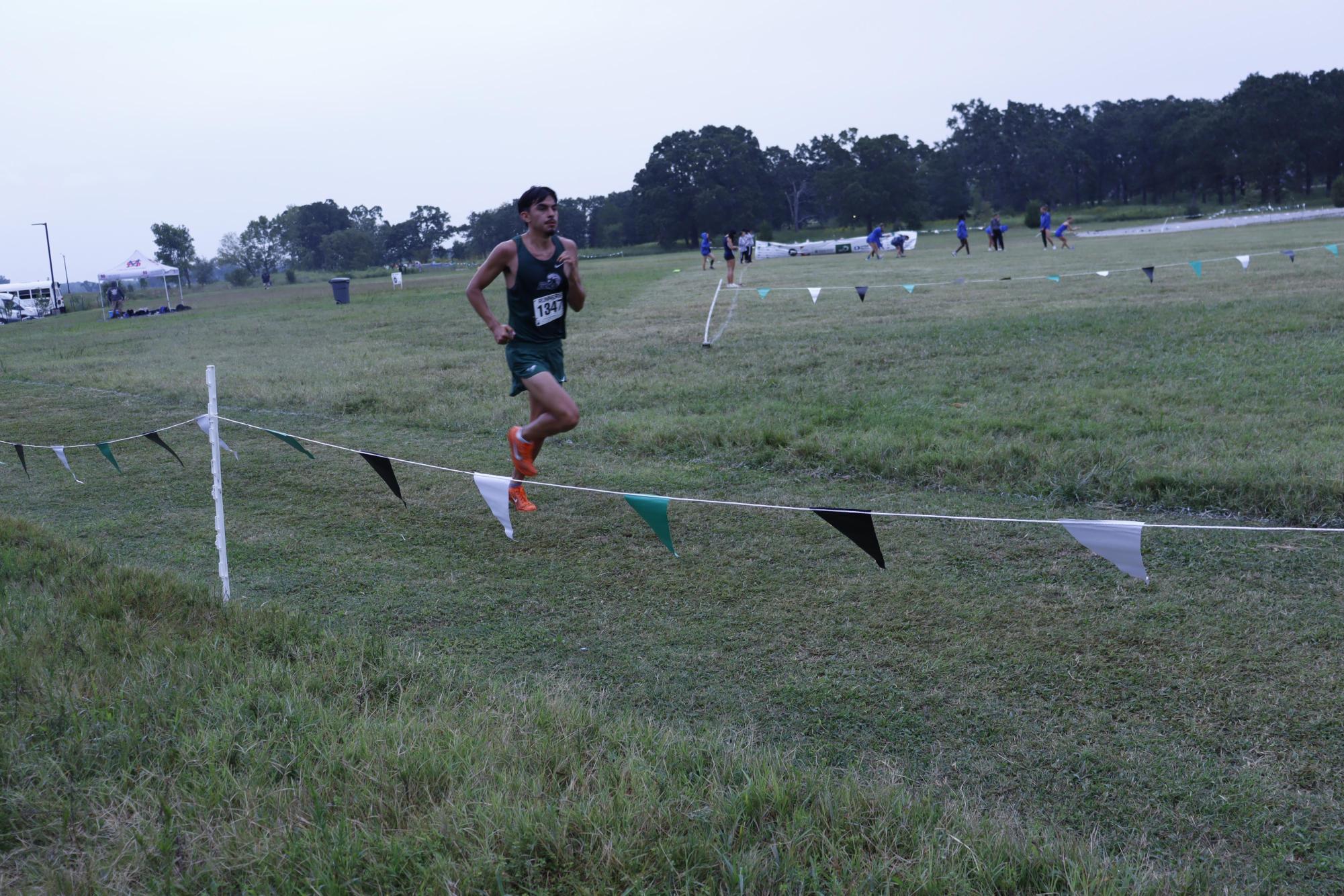 An Eagle runner competes in the Friday meet.