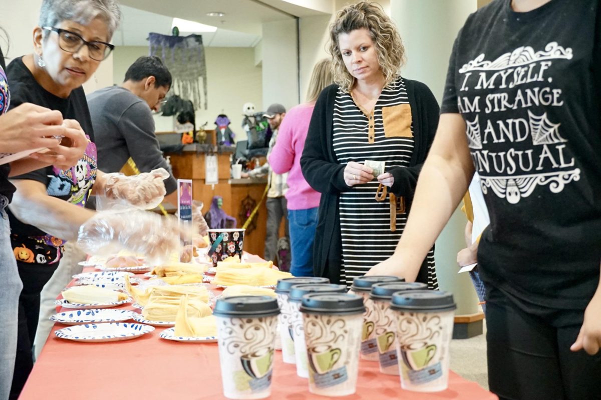 Visitors line up to enjoy treats at last year's Life table.