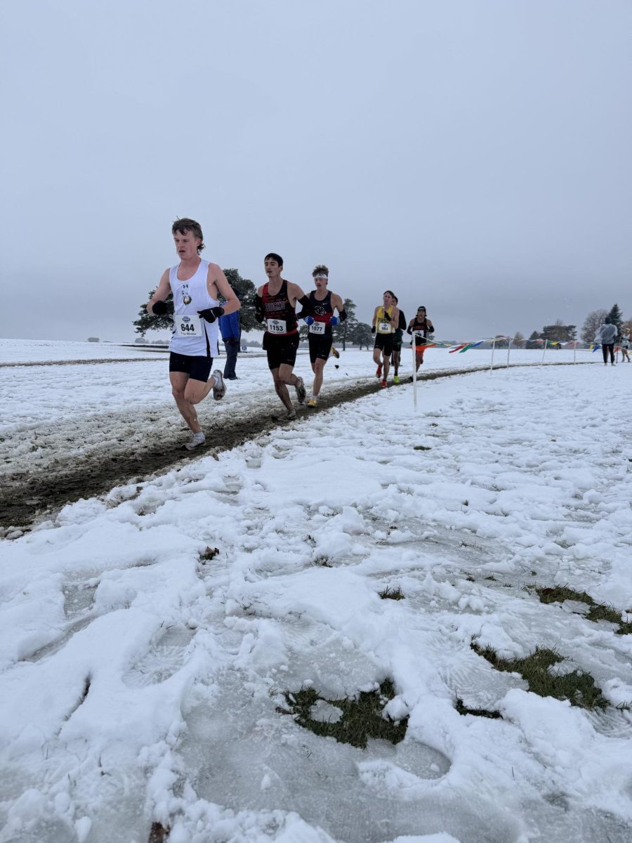 The men's cross country team battled snow and cold temperatures to compete in the national championship events.