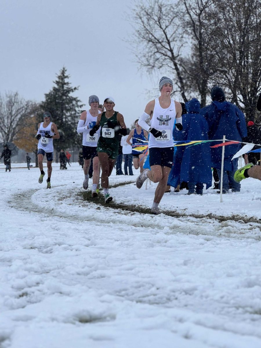 The men's cross-country team ran through a snow-covered course in the NJCCA championship. (Courtesy photo)