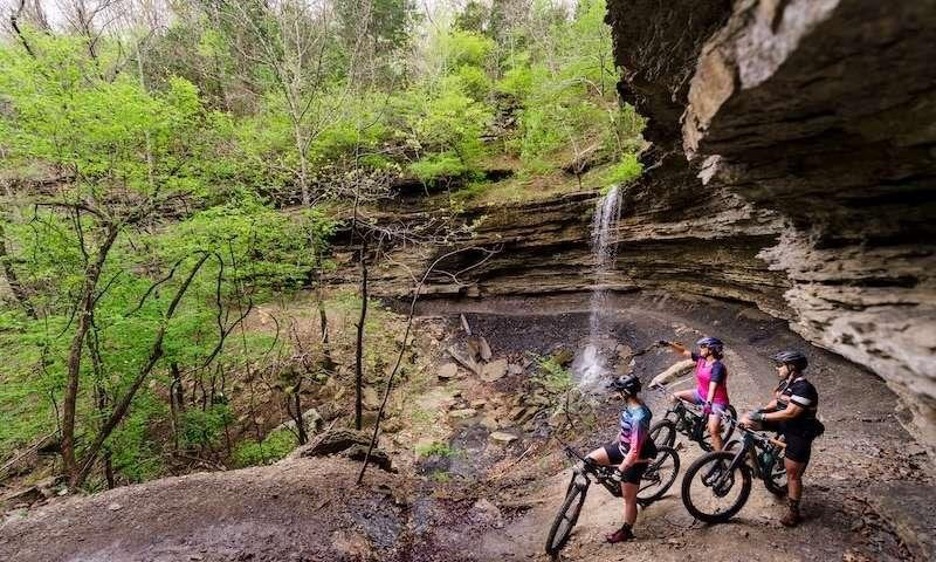 Bikers enjoy the scenery at Devil's Den State Park. The park, popular with many outdoor enthusiasts for camping, biking and hiking, was the scene of a double-homicide in July.